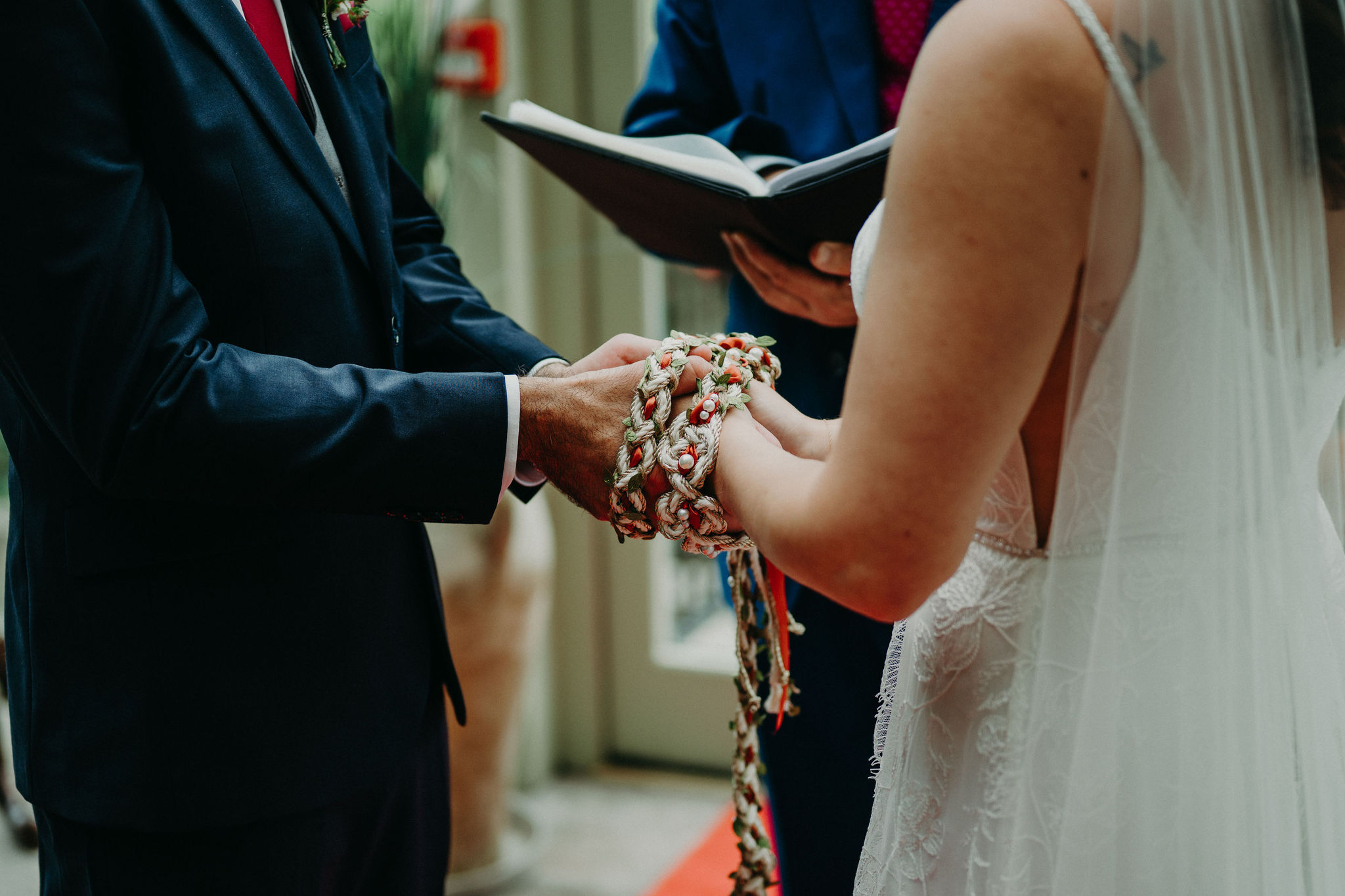Celtic handfasting ritual during intimate destination wedding in Ireland