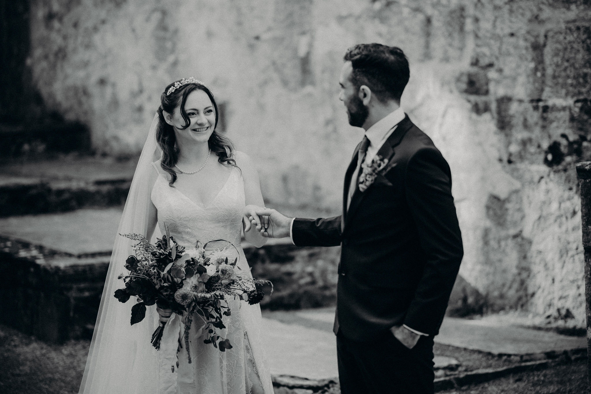 Black and white portrait of bride and groom at Muckross Abbey