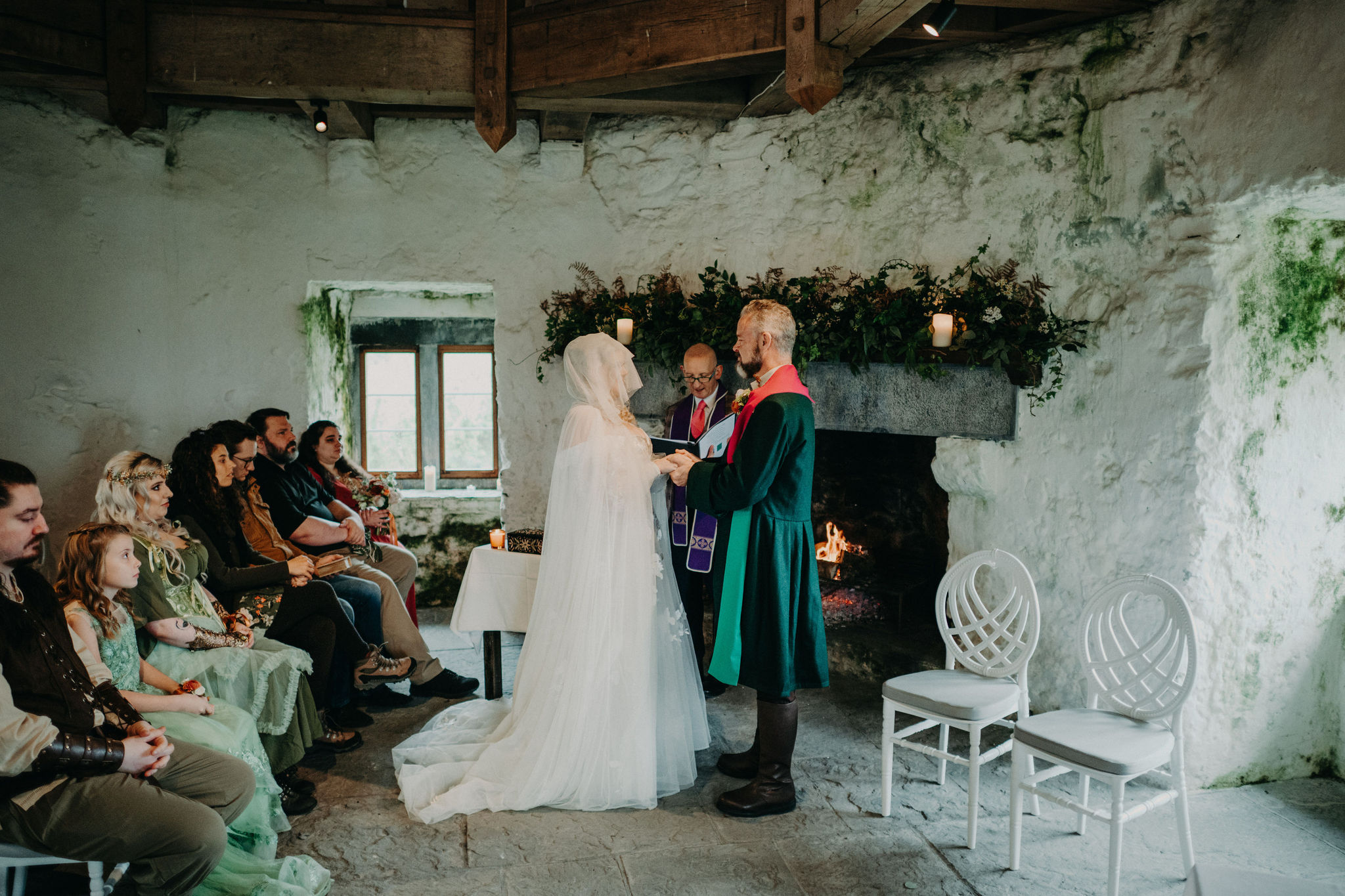 Intimate castle elopement ceremony at Newtown Castle in Ireland with family guests.