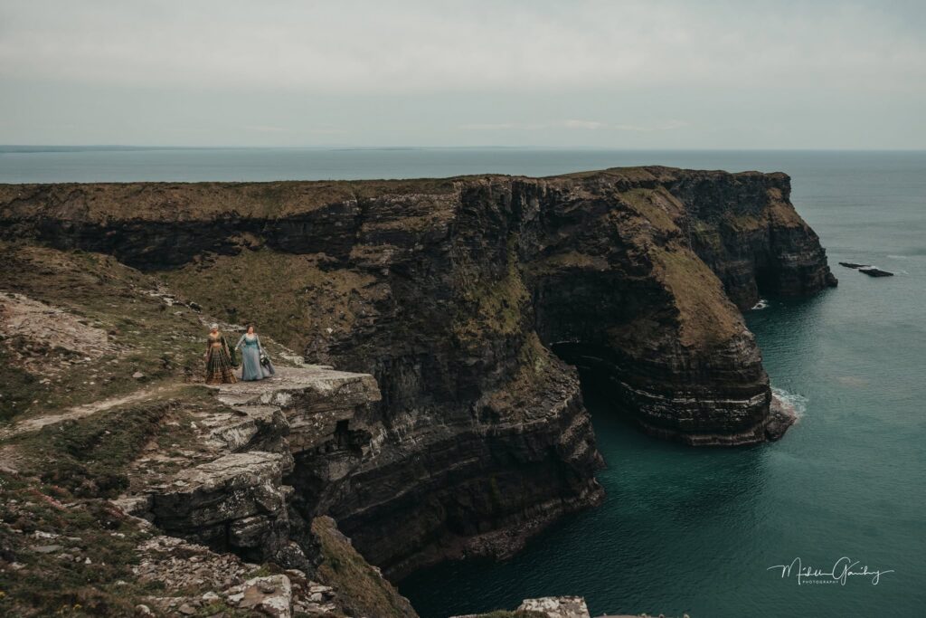 Couple eloping on the dramatic Cliffs of Moher coastline in Ireland